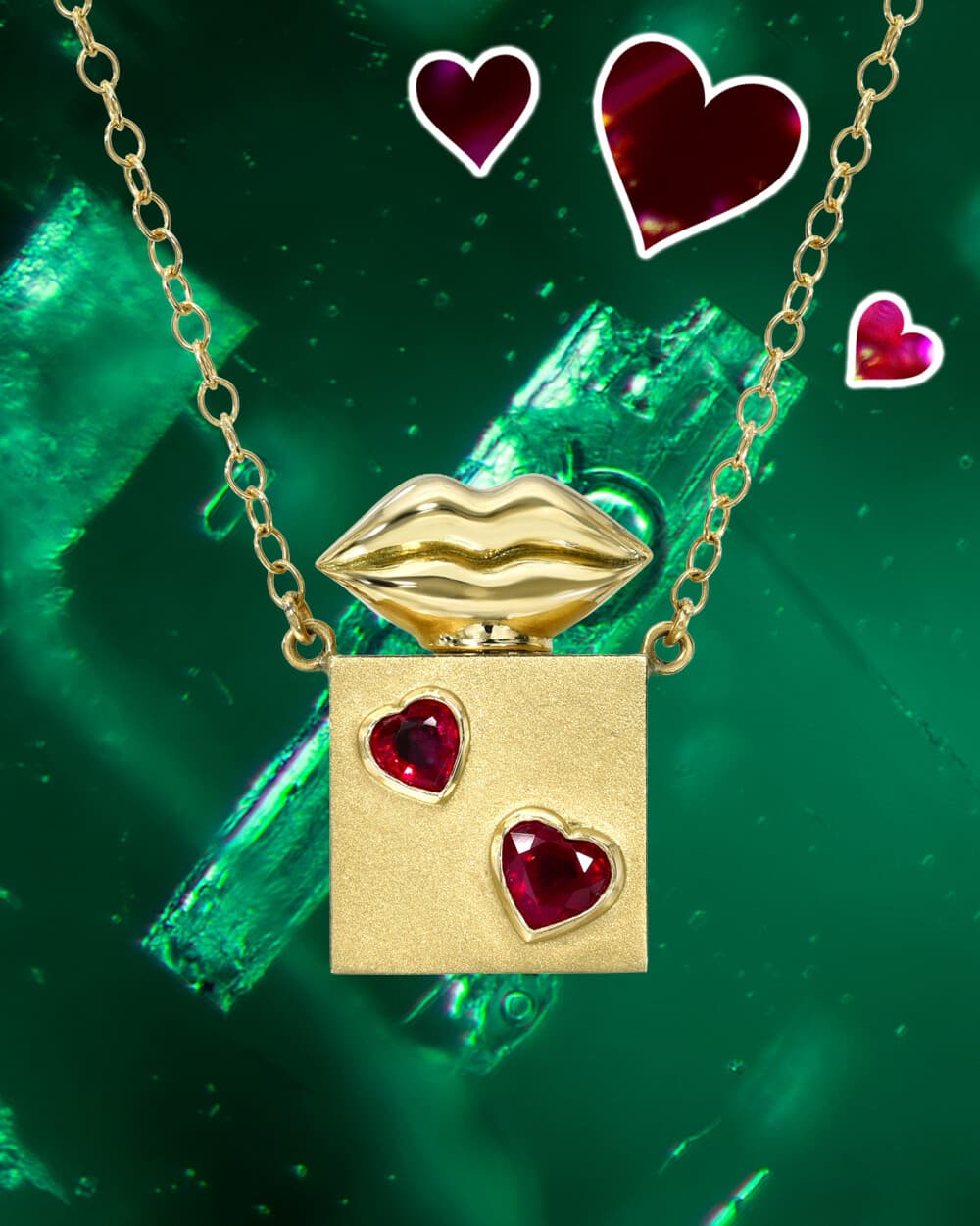 Gold Kiss Perfume Bottle Necklace with Heart-Shaped Mozambican Rubies